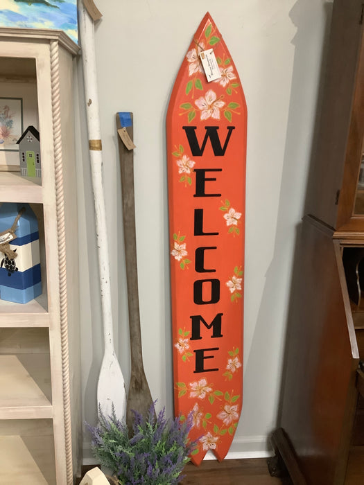 Standing surfboard welcome