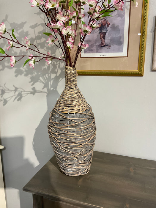 Woven willow and metal vase