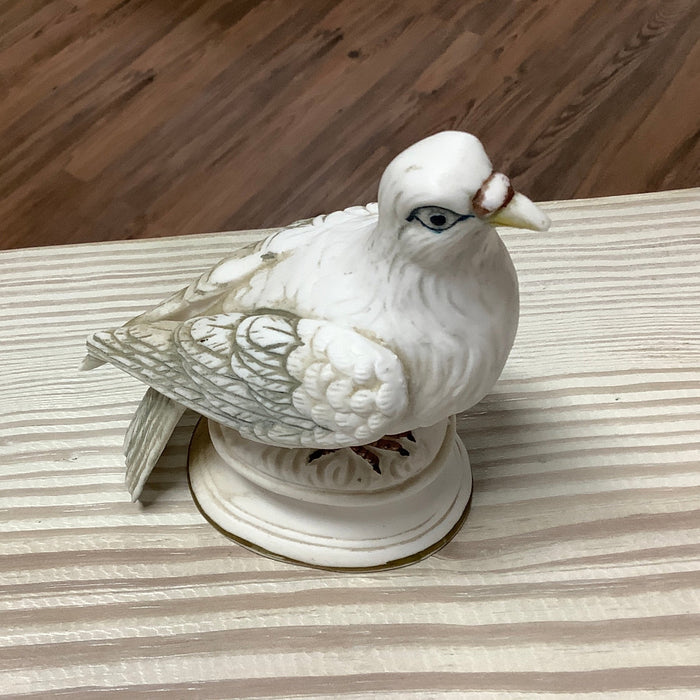 Ceramic pigeon figurine