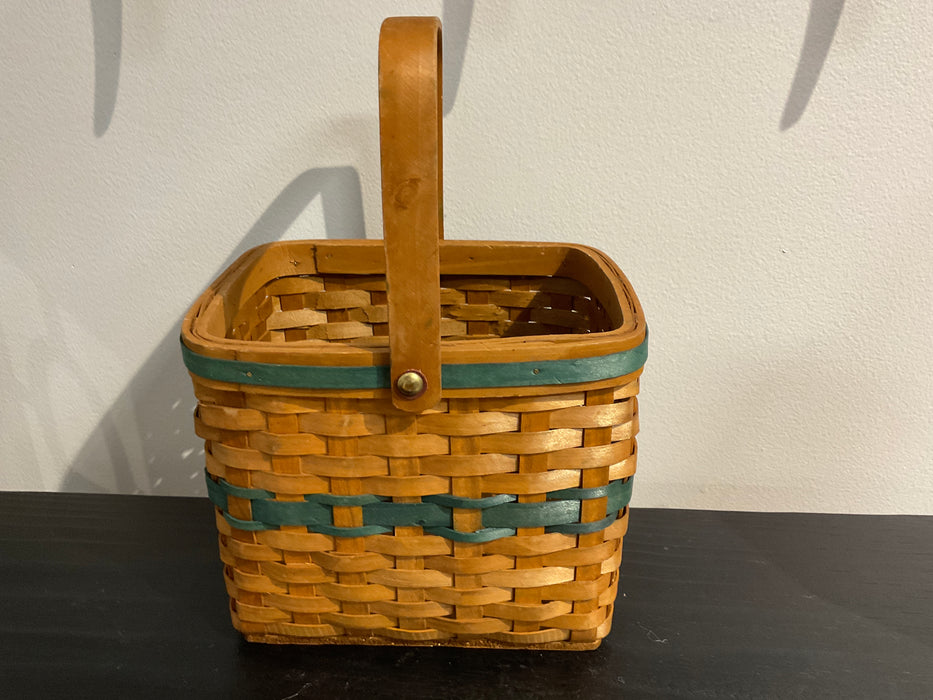 Deep handled basket with green stripes