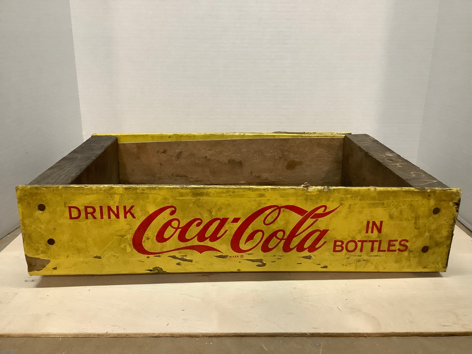 Yellow Coca-Cola crate