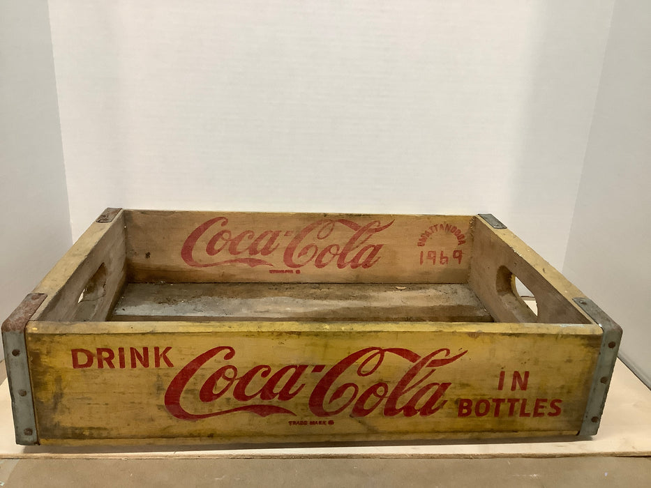 Yellow Coca-Cola wood crate 1969