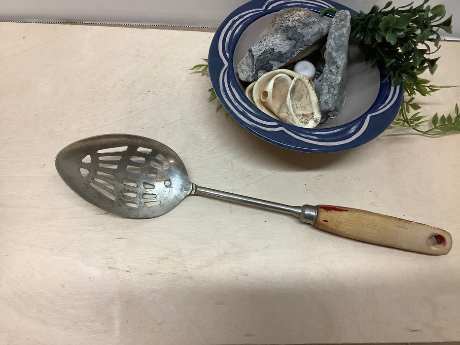1940’s Ekco slotted spoon w/red wood handle