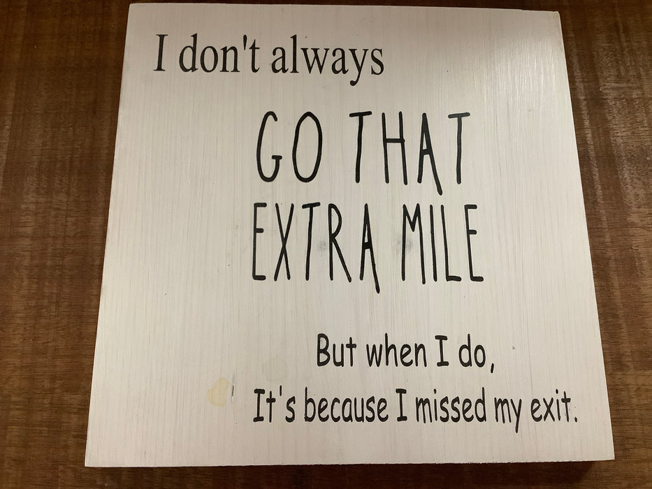 Funny wood sign - extra mile