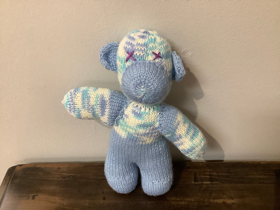 Knitted stuffed bear