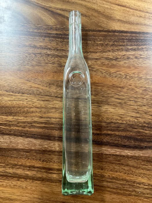 Tall skinny glass bottle